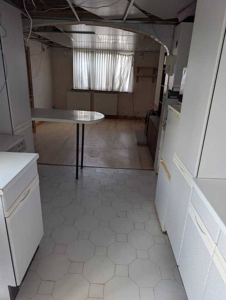 a clear, clean and tidy area at a door after a waste removal