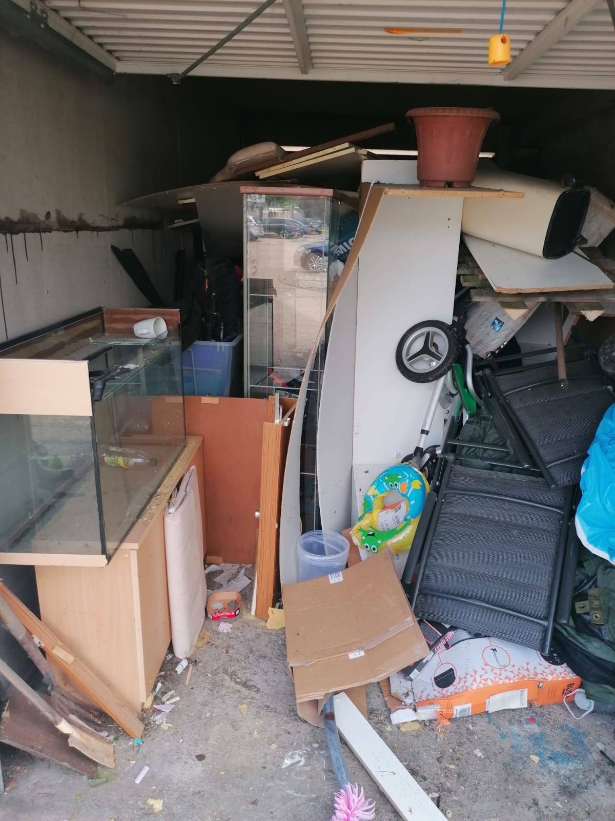 Essex Waste Man worker sitting in the removal van where they take rubbish