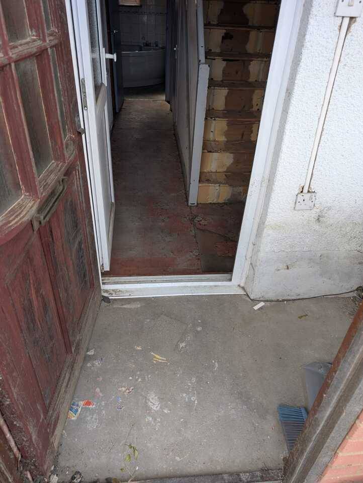 a-clear-clean-and-tidy-area-at-a-door-after-a-waste-removal.jpg